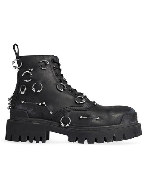 balenciaga piercing boots.